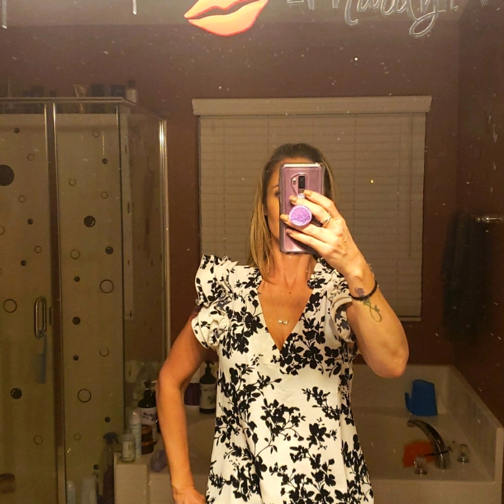 NWT MILK&HONEY Black &White flowers with ruffled shoulders.